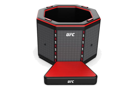 Black and red UFC octagonal training pad on a white background